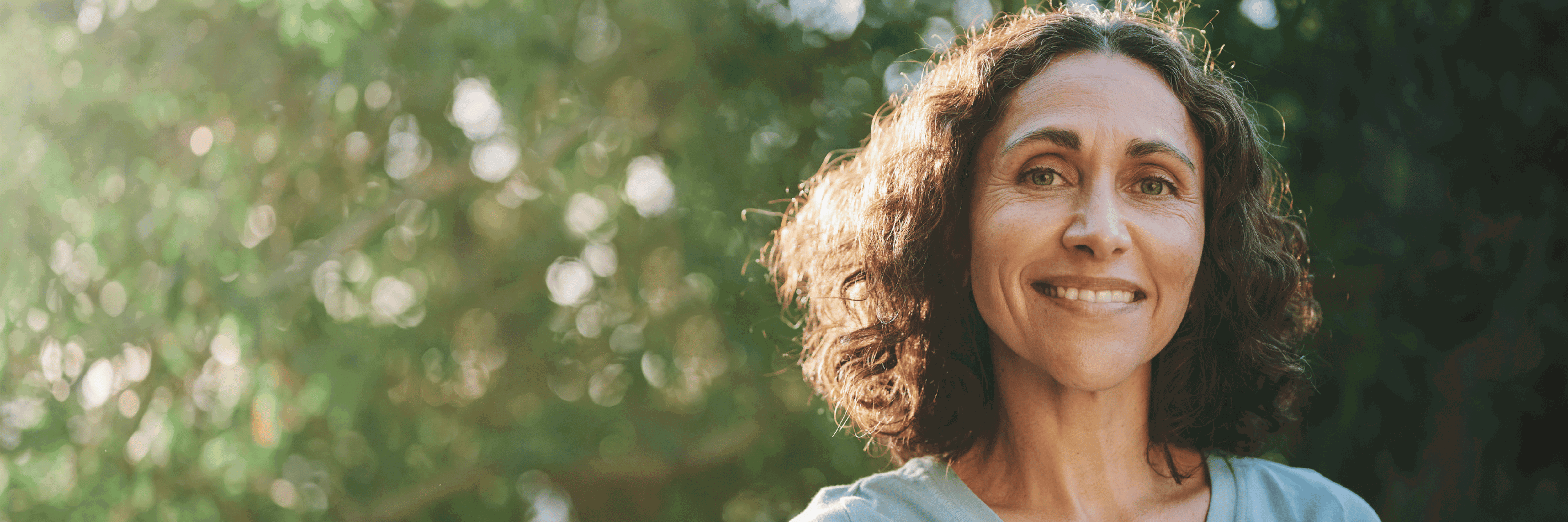 woman smiling in nature